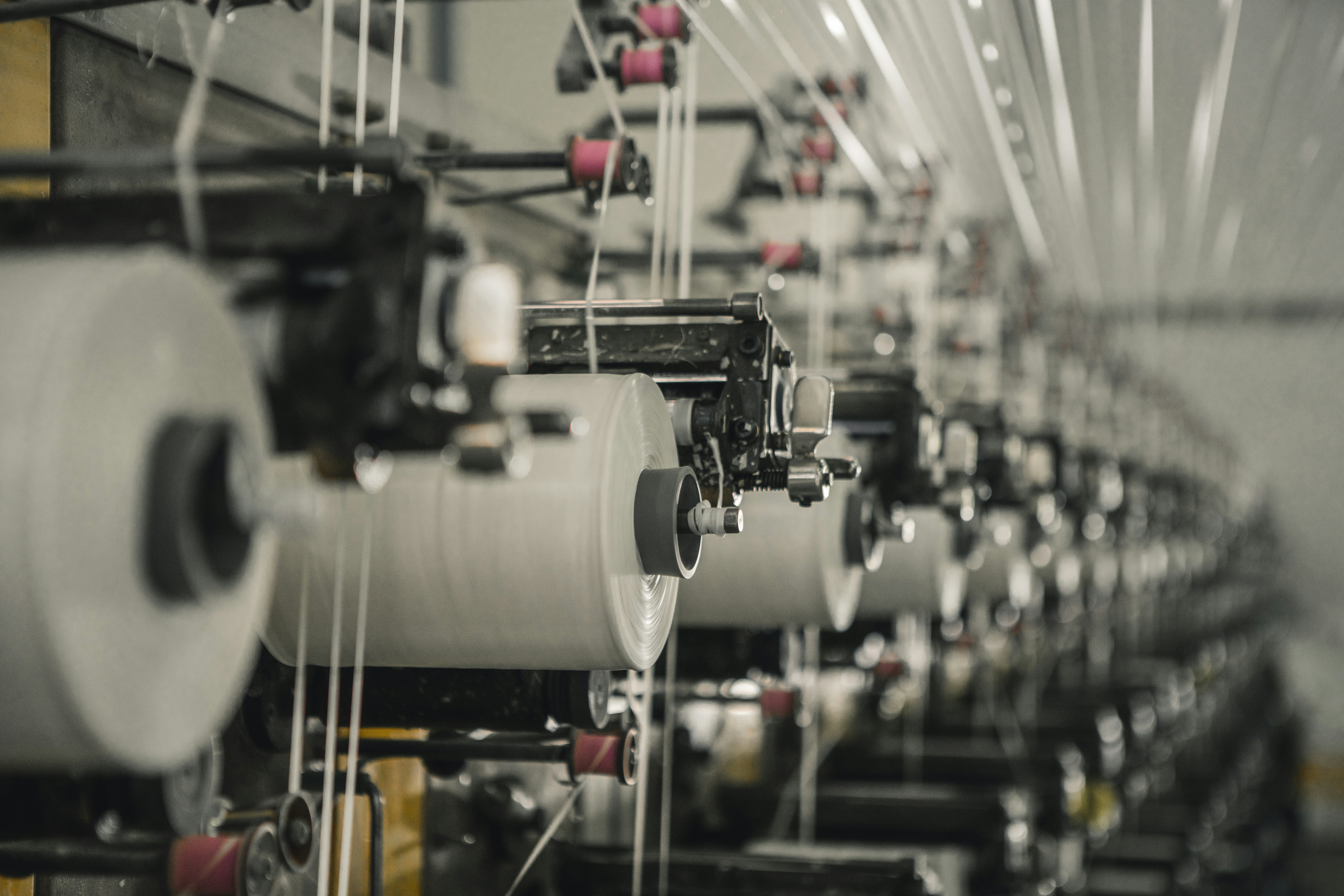 Clothing manufacturer reviewing garment quality